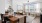 dining room table on wood-style flooring in a Skyline at Westfall Station apartment home