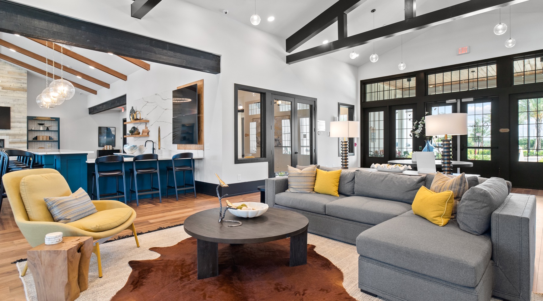 Find your perfect fit at Skyline at Westfall Station Skyline at Westfall Station community clubroom with a lounge room and resident kitchen