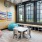 Open concept room with natural light and seating